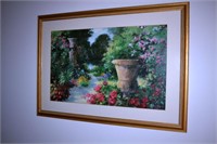 Large gilt framed print depicting a garden path af