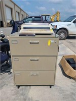 Filing Cabinet and Type Writer