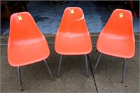 3 Fiberglass Orange Chairs