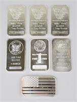 7 One Troy Ounce Fine Silver Bars.