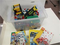 BOX OF THOUSANDS OF PIECES OF LEGO & MANUALS