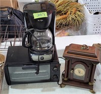 Household group, toaster oven, coffee pot, clock