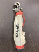 Antique golf club set; bag