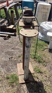Iron stand & vintage grinder on steel stand