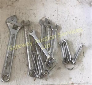 Crescent wrench, set of wrenches.
