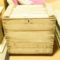 Primitive wooden storage chest with lift top