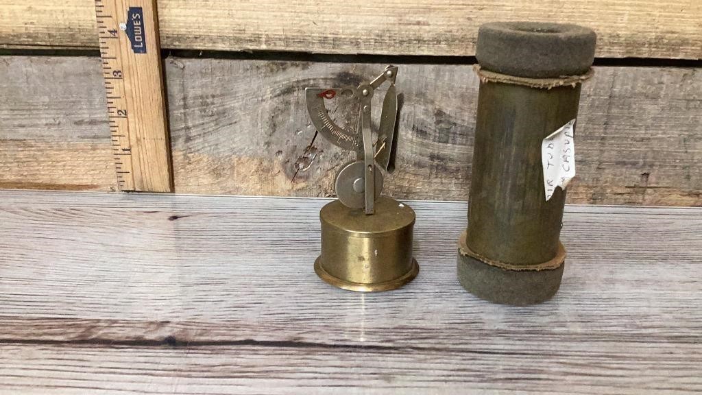Vintage letter scale and air tube canister