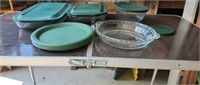 4 Pyrex Dishes, 4 Lids, 14 Plastic Plates