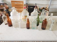 Old bottles & gal. Jugs