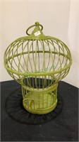 Rod iron and metal birdcage. Stands 12 inches