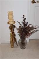 large clear glass vase and large brass candle