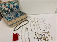 Wicker box with pendants. Chains. Rosary