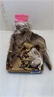 animal fur, wooden beads, shells, antlers