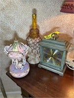 Misc group of decorative items including mantle cl