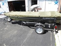 12' Alumacraft flat bottom boat w/ Karavan trailer