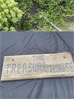 The treasure House wooden sign