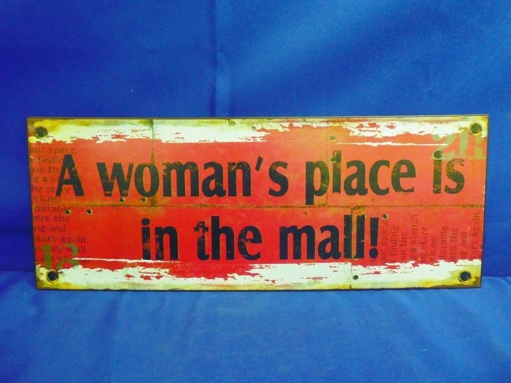 A Woman's Place Is In The Mall Metal Sign 18" X 7"
