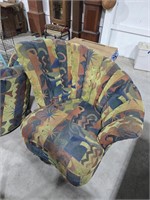Pair of upholstered barrel back chairs