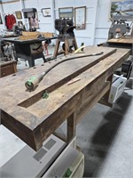 Vintage woodworkers workbench with vise