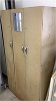 Metal cabinet approx 68”x35”
