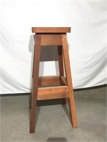 Wooden stool.