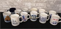 12 coffee mugs with various ships on them.