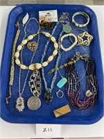 Tray lot costume jewelry - ring necklace pin