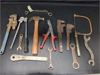 Pipe wrenches, hammer, coping saw, other tools