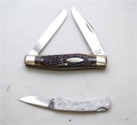 Buck USA tooled metal handled miniatur folding hun