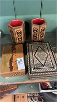 Two small wooden boxes and two small candle