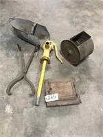 Ice tongs, well pump, stove door, butter churn,