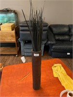 Bamboo vase with greenery