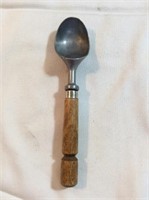 Vintage wooden handled ice cream scoop