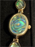Ladies watch with mother of pearl bezel and band