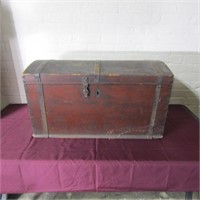 Antique wood trunk. Dove tailed steel banded.