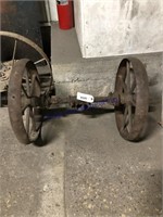 PAIR OF IRON WHEELS ON AXLE, 16" ACROSS