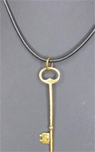 Droll nickel free necklace with key pendant