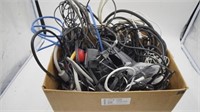 Box of misc chargers, power cords, adapters