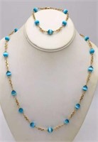 Gold Toned And Blue Beaded Necklace and Bracelet