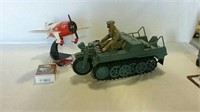 Toy half-track military and airplane