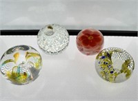 (4) GLASS PAPERWEIGHTS