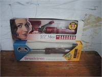 2 CURLING IRONS IN BOXES