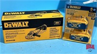 Unused Dewalt 4 1/2" angle Grinder C/W 2 Batteries