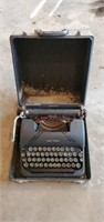 Smith Corona portable typewriter with case
