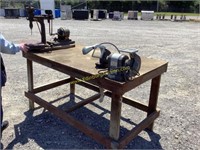 E2. Work bench with drill press and grinder works