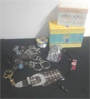 Decorative boxes, fishing line, piece of a belt,