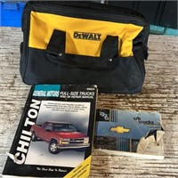 Nylon DeWalt Tool Bag and 2 GM Repair Manuals.