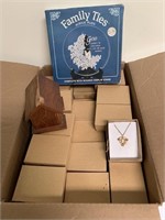 Box full of new necklaces and faith based decor