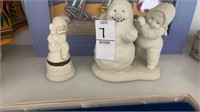 Snow babies figurines, beach frame