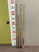 Misc pool cues. 1 Budweiser